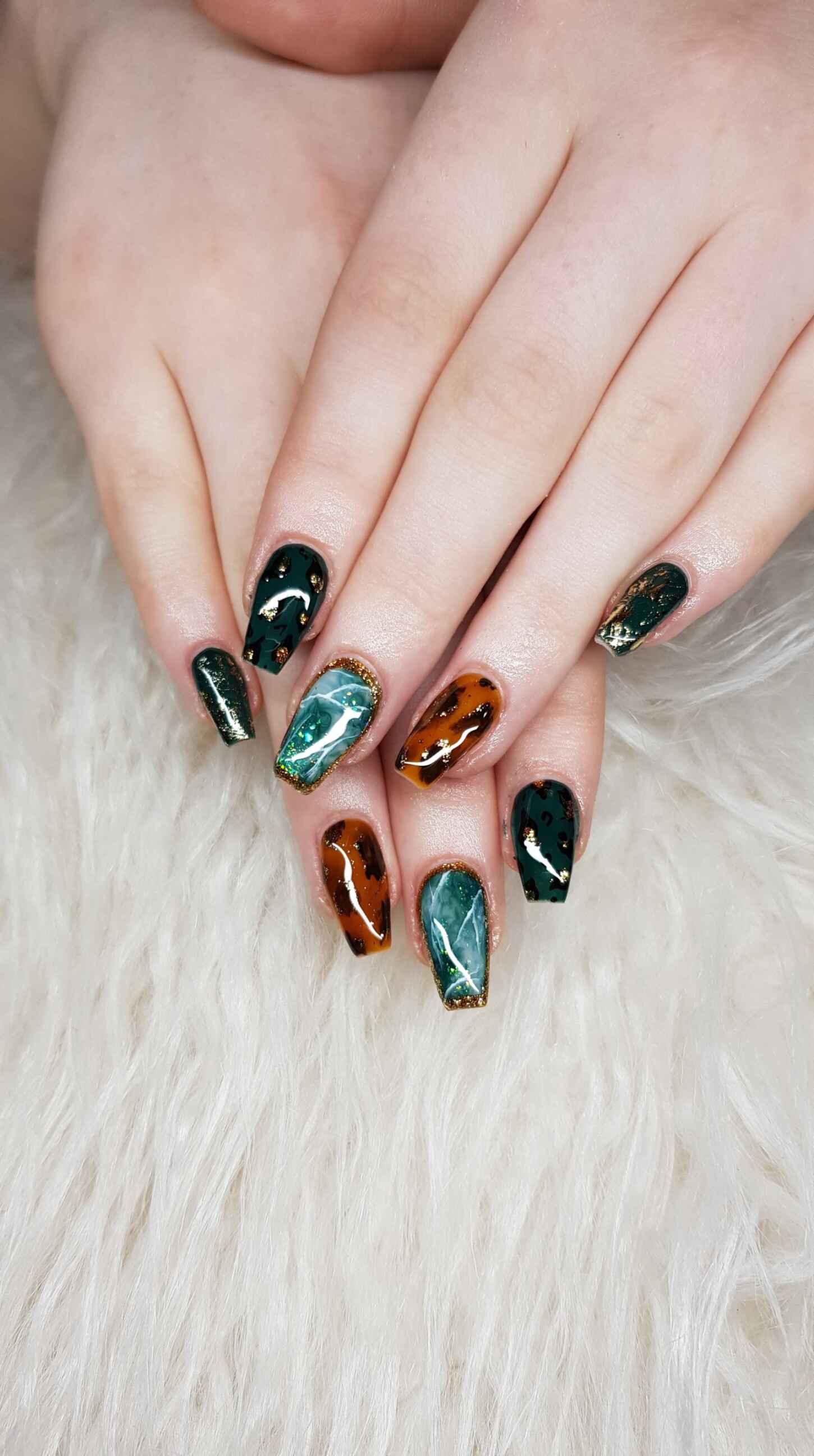 Tortoise Shell And Opal Nails With Gold Accents For Christmas